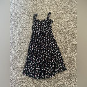 Black billabong dress with floral pattern, size Medium